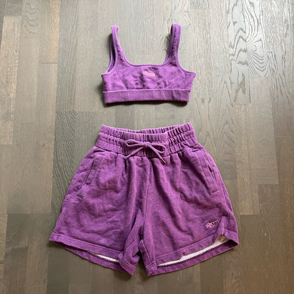 Melody ehsani orange speckled purple workout set